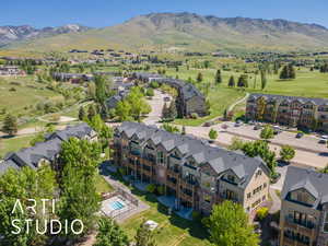 Aerial view of residential area with a mountain backdrop