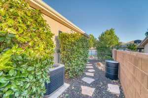 View of yard with central AC