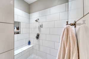 Bathroom with a tile shower