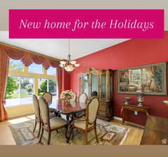 Dining area featuring a chandelier and wood finished floors