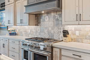 Gas Range and Hood.