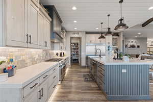 Kitchen, underlit cabinets, large pantry, large/tall island.