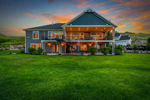 Large covered deck. Large covered patio. String lights to set a mood. Large flat backyard.