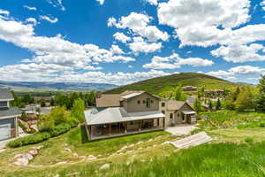 View from above of property featuring a mountain backdrop