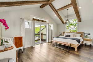 Master Bedroom with access to outside, multiple windows, hardwood / wood-style flooring, and recessed lighting