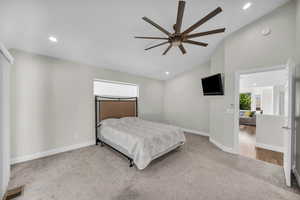 Bedroom with carpet floors, baseboards, recessed lighting, high vaulted ceiling, and a ceiling fan