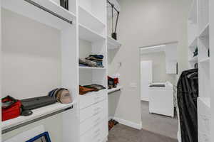 Walk in closet with washer / dryer