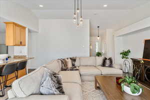 Living area with high vaulted ceiling