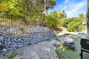 View of yard with a fire pit