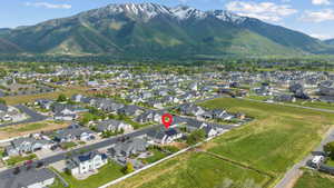 View of property location with a mountainous background and nearby suburban area