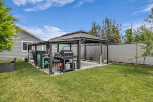 View of yard featuring a gazebo and a patio