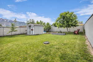 View of yard featuring a vegetable garden and a mountain view