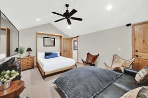 Bedroom featuring vaulted ceiling, light colored carpet, recessed lighting, and ceiling fan