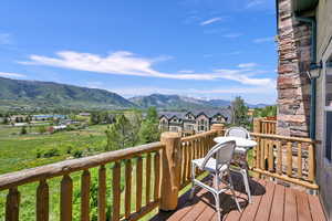 Wooden deck with a mountain view