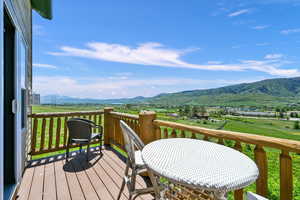 Wooden deck with a mountain view