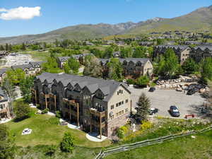 Aerial perspective of suburban area with a mountain backdrop
