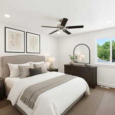 Carpeted bedroom featuring recessed lighting and a ceiling fan