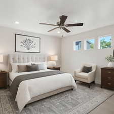 Bedroom featuring carpet flooring, ceiling fan, and recessed lighting