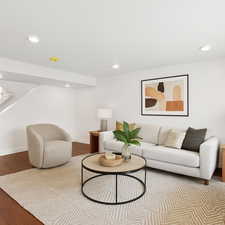 Living area featuring recessed lighting and wood finished floors