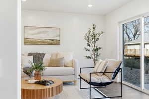 Living area featuring recessed lighting and wood finished floors