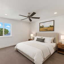 Carpeted bedroom featuring recessed lighting and ceiling fan