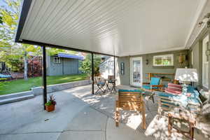 View of patio with outdoor dining area and outdoor lounge area