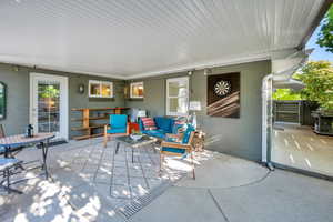 View of patio featuring outdoor lounge area and grilling area