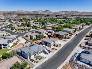 Aerial perspective of suburban area featuring mountains