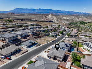 Aerial perspective of suburban area featuring mountains