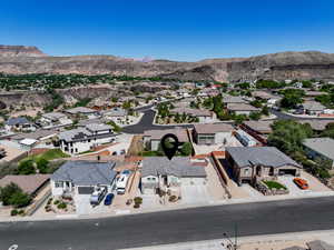 Aerial perspective of suburban area with mountains