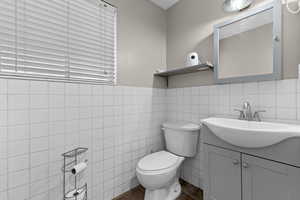 Bathroom with toilet and vanity