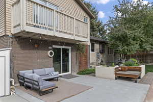 View of patio / terrace with an outdoor living space and a balcony