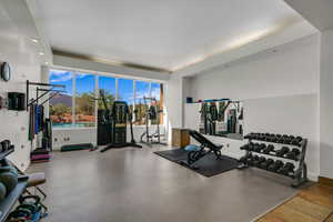 Workout area featuring recessed lighting and baseboards