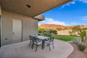 Fenced backyard featuring a patio area and outdoor dining space