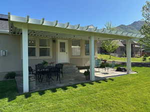 View of patio / terrace with a mountain view