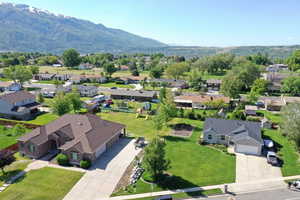 Aerial view of residential area featuring mountains