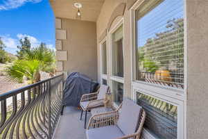 Balcony featuring area for grilling