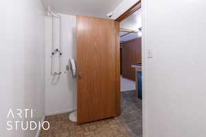 Bathroom featuring baseboards