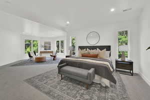 Master bedroom with sitting room and plenty of windows.