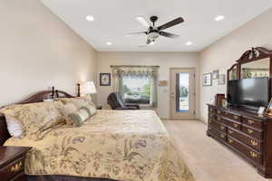 Bedroom with access to outside, light carpet, recessed lighting, and ceiling fan