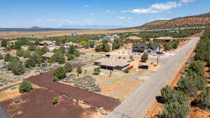 Aerial view of residential area featuring mountains