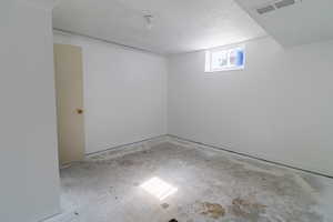5th bedroom downstairs does not have flooring but does have a bathroom in the room