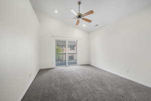 Empty room with high vaulted ceiling, carpet, a ceiling fan, and recessed lighting