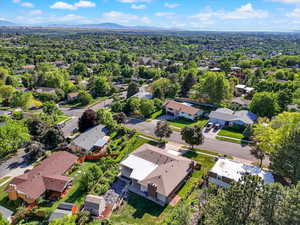 Aerial view of residential area featuring a mountain backdrop