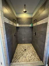 Bathroom with a tile shower