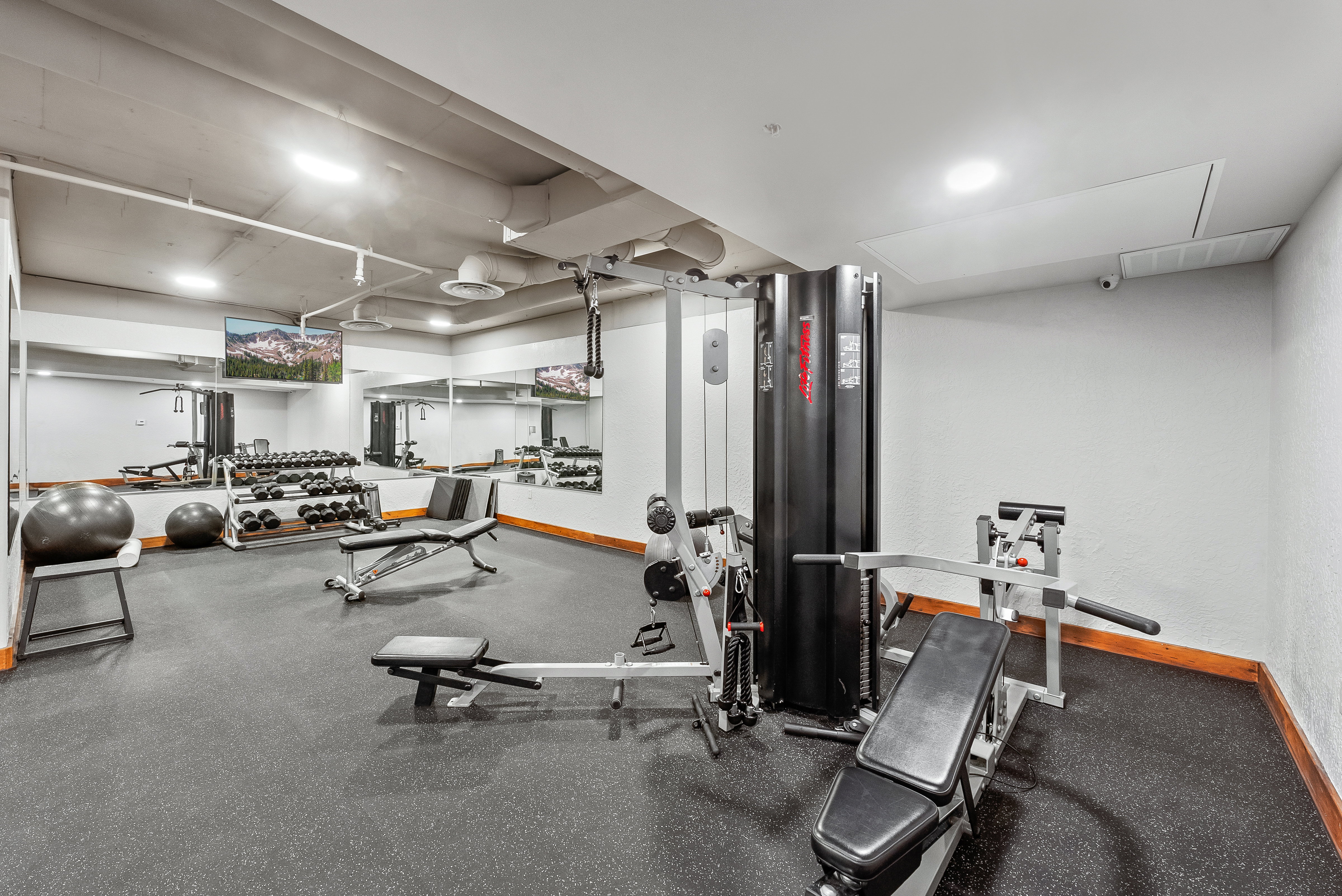 Gym featuring baseboards