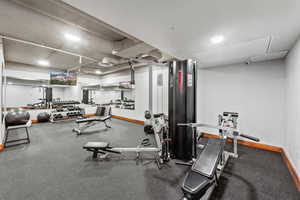 Gym featuring baseboards