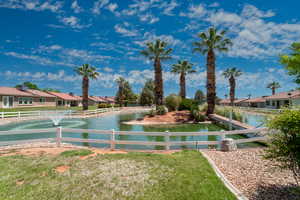 Surrounding community featuring a residential view and a water view