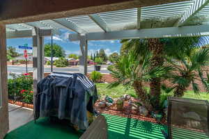 View of patio / terrace featuring a pergola and a grill
