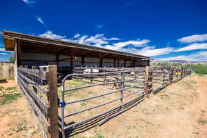 View of outbuilding featuring an exterior structure